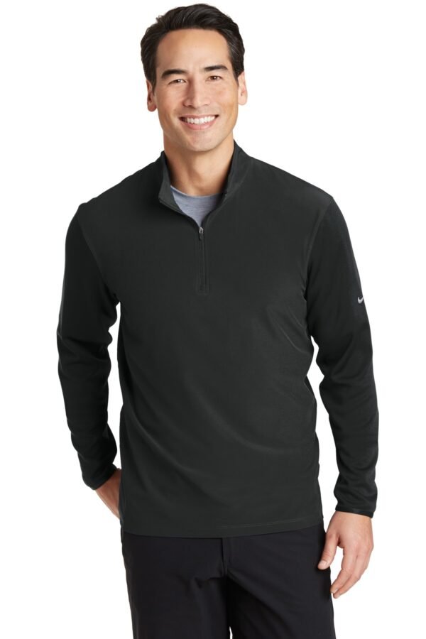 DISCONTINUED  Nike Dri-FIT Fabric Mix 1/2-Zip Cover-Up.  746102